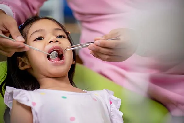 Little,Asian,Girls,Teeth,Are,Healthy,In,The,Dental,Office.